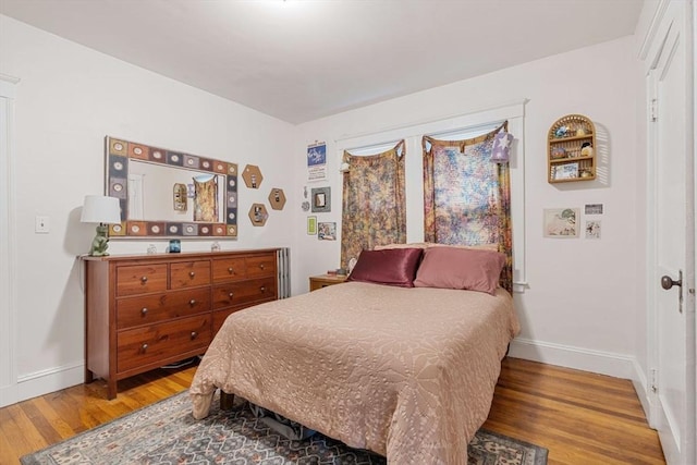 111 Williams St Unit 1, Boston, MA 02130 - bedroom featuring wood finished floors and baseboards