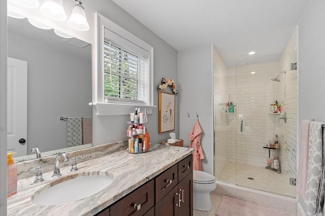 159 Marked Tree Rd, Needham, MA 02492 - bathroom with vanity, a stall shower, toilet, tile patterned floors, and recessed lighting