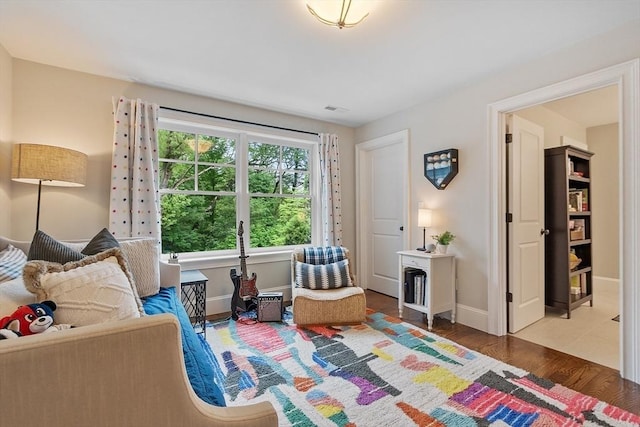 159 Marked Tree Rd, Needham, MA 02492 - living room featuring baseboards and wood finished floors