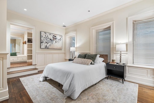 8 Garrison St Unit 104, Boston, MA 02116 - bedroom with a decorative wall, wood finished floors, ornamental molding, recessed lighting, and a wainscoted wall