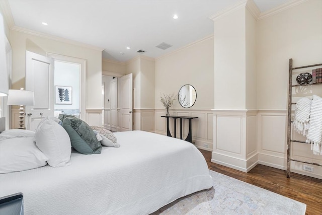 8 Garrison St Unit 104, Boston, MA 02116 - bedroom featuring wood finished floors, ornamental molding, a wainscoted wall, recessed lighting, and a decorative wall