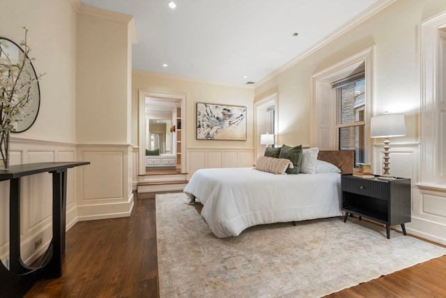 bedroom featuring crown molding and hardwood / wood-style floors