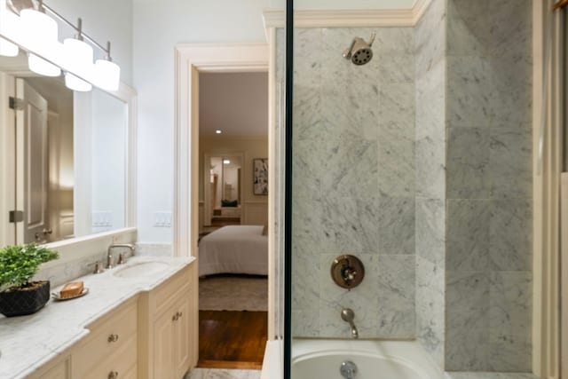 bathroom with vanity, plus walk in shower, and hardwood / wood-style flooring