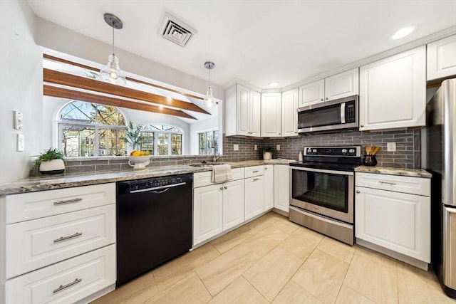 kitchen featuring pendant lighting, stainless steel appliances, decorative backsplash, and white cabinets