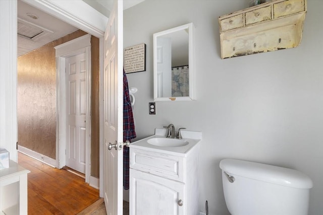 85 Pinehurst Ave, Auburn, MA 01501 - bathroom with vanity, toilet, and wood finished floors
