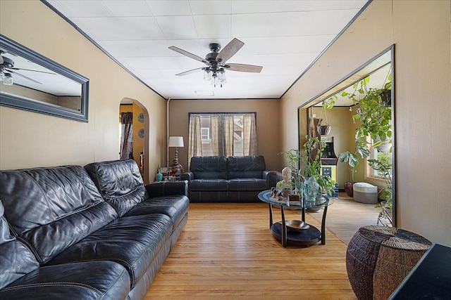 85 Pinehurst Ave, Auburn, MA 01501 - living room with arched walkways, ceiling fan, and light wood finished floors