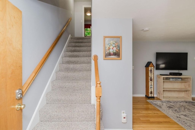 44 Spruce Tree Ln Unit 44, Norton, MA 02766 - staircase featuring wood finished floors and baseboards