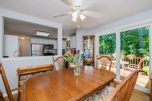 44 Spruce Tree Ln Unit 44, Norton, MA 02766 - dining space featuring a ceiling fan and light wood-type flooring