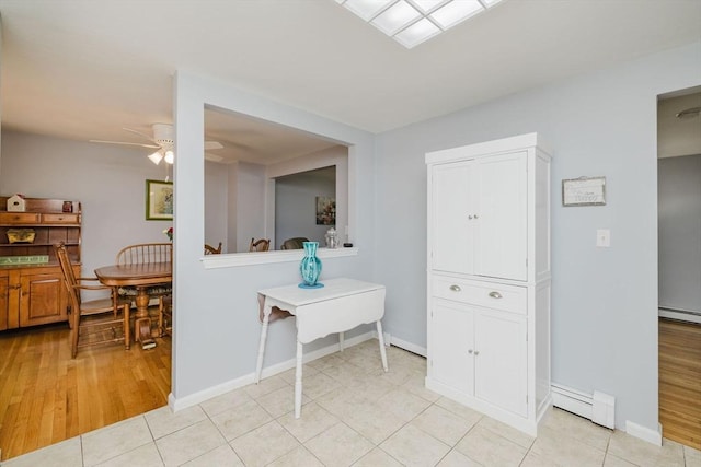 44 Spruce Tree Ln Unit 44, Norton, MA 02766 - hall featuring a baseboard heating unit and light wood-style flooring
