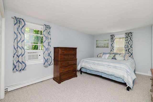 44 Spruce Tree Ln Unit 44, Norton, MA 02766 - carpeted bedroom featuring a baseboard heating unit, multiple windows, and cooling unit