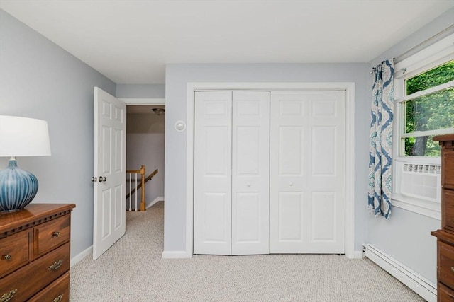 44 Spruce Tree Ln Unit 44, Norton, MA 02766 - bedroom with a baseboard radiator, light carpet, a closet, and cooling unit