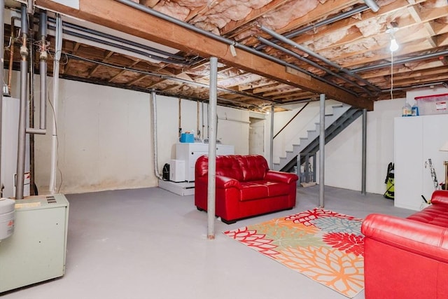 44 Spruce Tree Ln Unit 44, Norton, MA 02766 - unfinished basement featuring separate washer and dryer and stairway