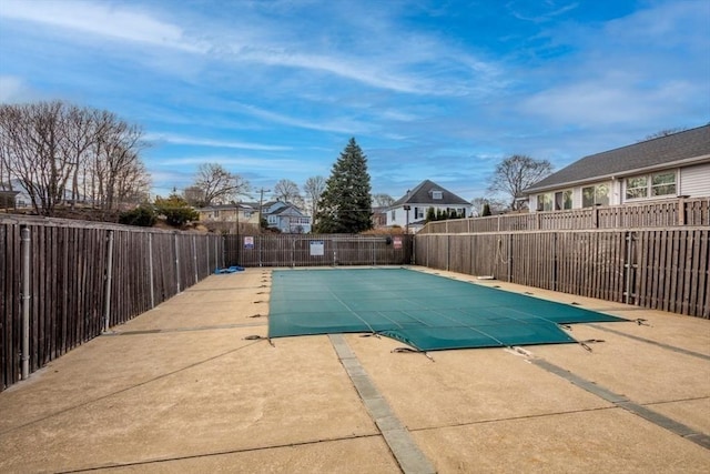 289 Elm St Unit 34B, Medford, MA 02155 - community pool featuring a patio, a fenced backyard, and a residential view