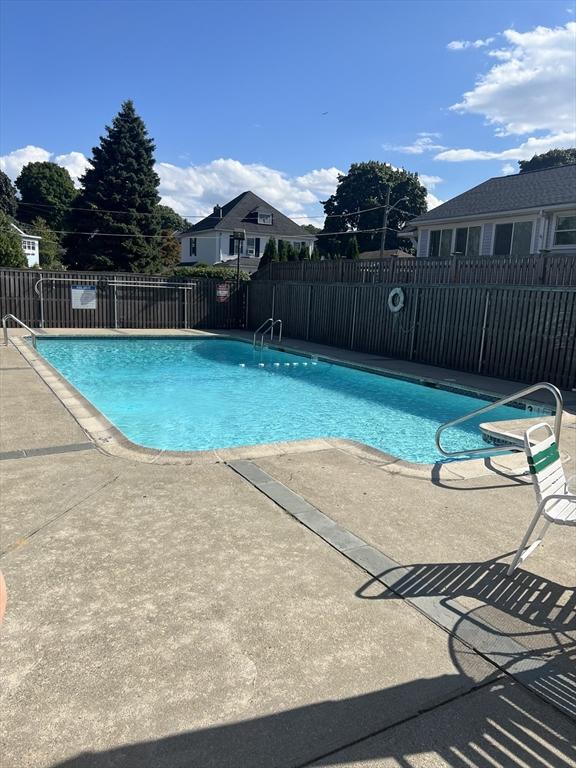 289 Elm St Unit 34B, Medford, MA 02155 - community pool featuring a patio