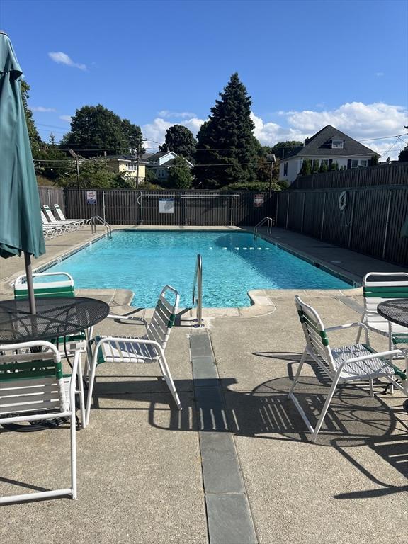 289 Elm St Unit 34B, Medford, MA 02155 - community pool featuring a patio area
