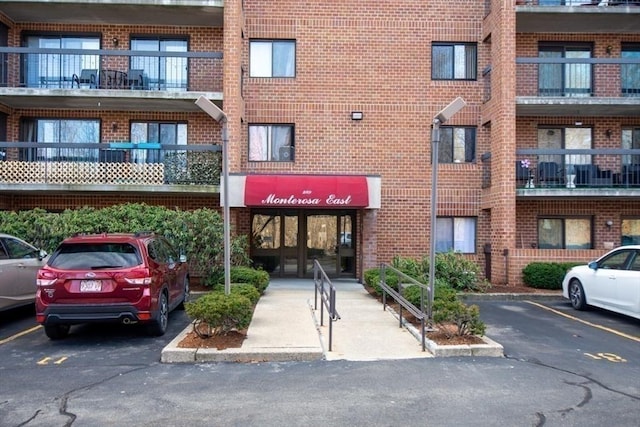 289 Elm St Unit 34B, Medford, MA 02155 - view of apartment building / complex featuring uncovered parking
