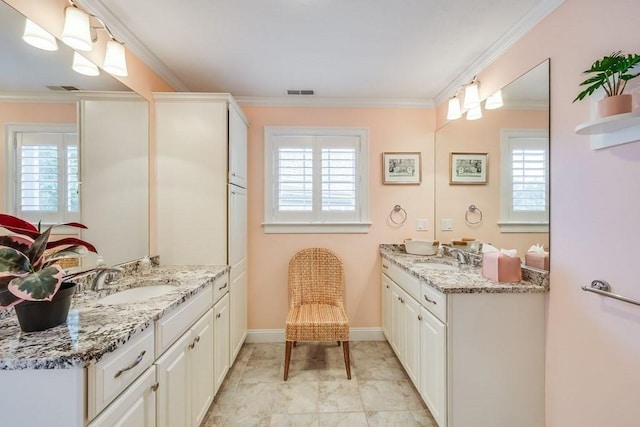 bathroom with vanity and crown molding