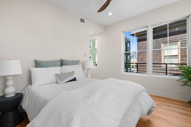 142 Amory St Unit 2, Cambridge, MA 02139 - bedroom featuring wood finished floors, recessed lighting, and ceiling fan