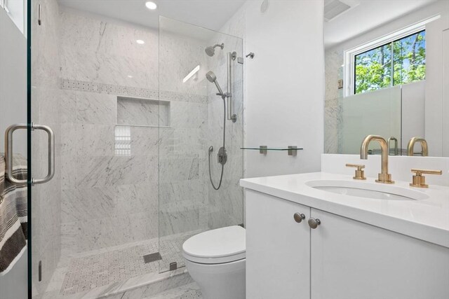 142 Amory St Unit 2, Cambridge, MA 02139 - full bathroom with a shower stall, toilet, vanity, recessed lighting, and marble finish flooring