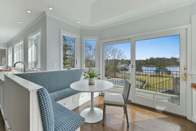sunroom with a water view