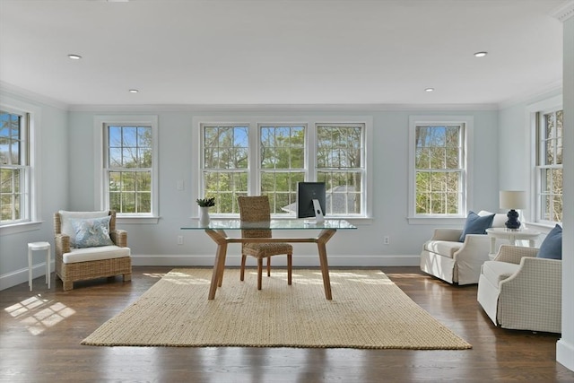 office space with dark wood-style floors, baseboards, and ornamental molding
