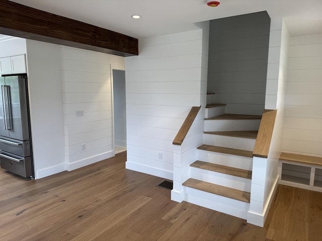 8 Sconset Ave, Nantucket, MA 02564 - stairway featuring wood finished floors, baseboards, recessed lighting, and wood walls