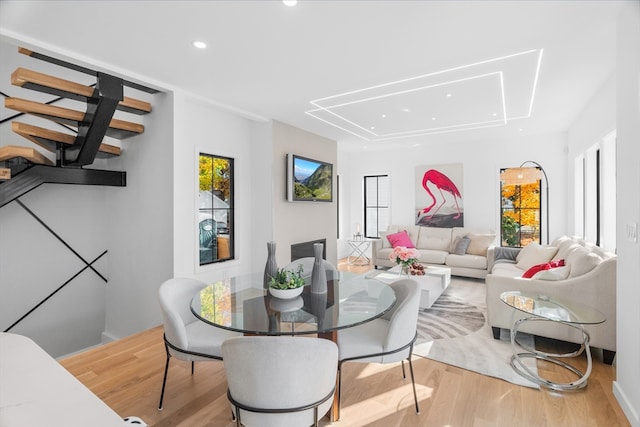 dining area with light hardwood / wood-style flooring