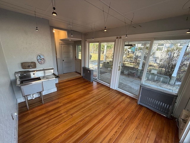 sunroom featuring radiator