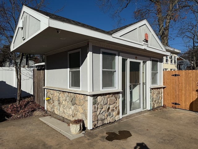 view of home's exterior with a patio