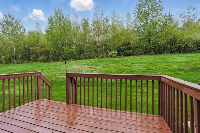 deck featuring a lawn
