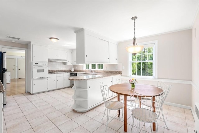 64 Bakers Hill Rd, Weston, MA 02493 - kitchen with oven, open shelves, white cabinets, a peninsula, and light tile patterned flooring