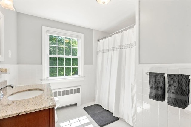 64 Bakers Hill Rd, Weston, MA 02493 - bathroom with radiator heating unit, tile walls, a wainscoted wall, vanity, and a shower with curtain