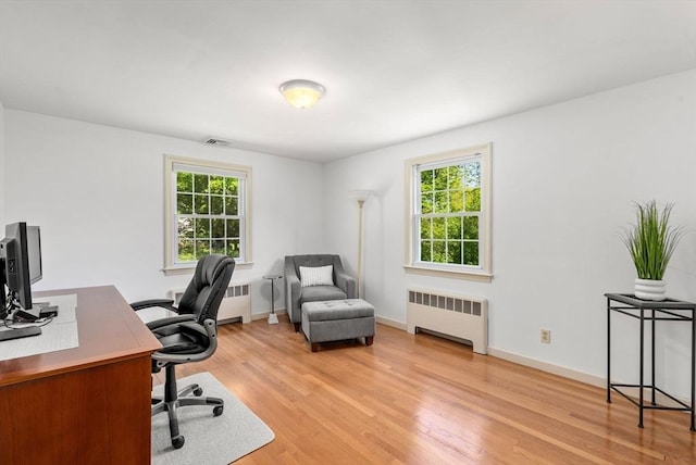 64 Bakers Hill Rd, Weston, MA 02493 - office area with radiator heating unit, light wood-style floors, and baseboards