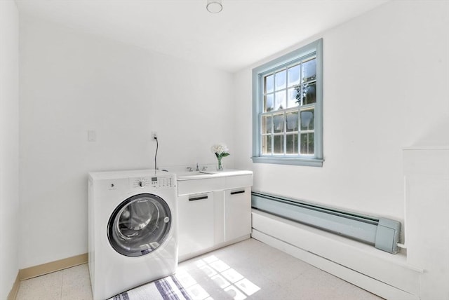 64 Bakers Hill Rd, Weston, MA 02493 - laundry room featuring washer / clothes dryer, a baseboard heating unit, light flooring, and cabinet space