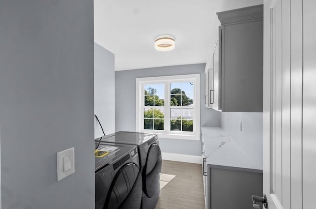 320 Old Westport Rd, Dartmouth, MA 02747 - laundry room with washer and dryer and light wood-style floors