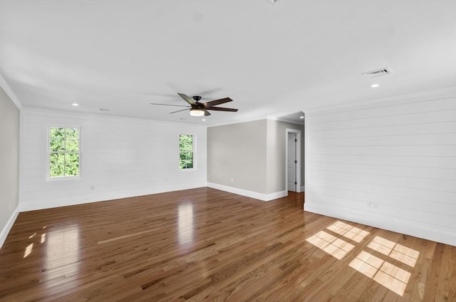 320 Old Westport Rd, Dartmouth, MA 02747 - unfurnished room with ornamental molding, plenty of natural light, a ceiling fan, wood finished floors, and recessed lighting