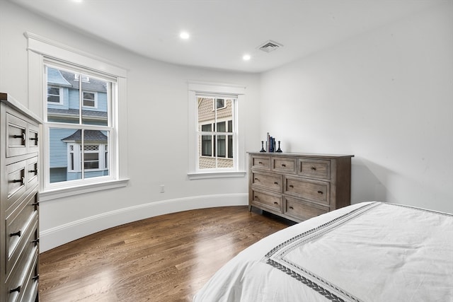 bedroom featuring dark hardwood / wood-style floors