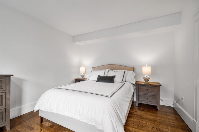 bedroom featuring dark hardwood / wood-style floors