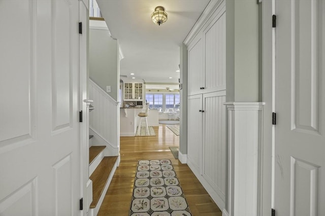 corridor featuring hardwood / wood-style flooring