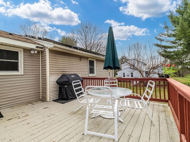 13 Independence Ln, Millis, MA 02054 - wooden terrace with outdoor dining area and area for grilling