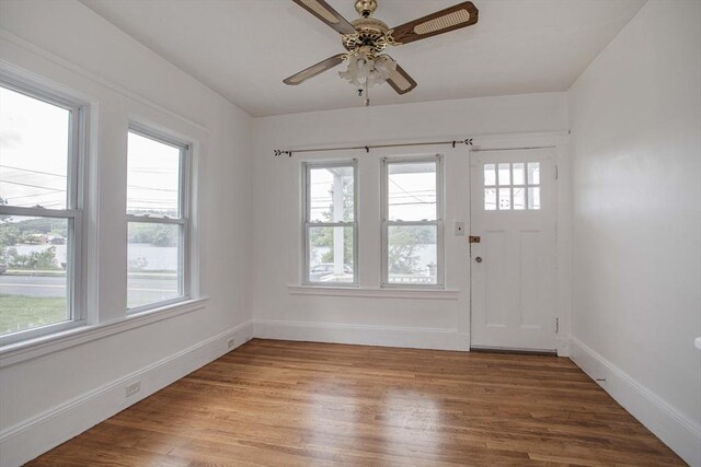 108 Arlington Rd, Woburn, MA 01801 - entryway with healthy amount of natural light, light wood-style flooring, and ceiling fan