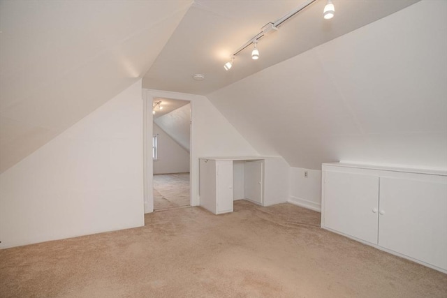108 Arlington Rd, Woburn, MA 01801 - additional living space with light carpet and vaulted ceiling