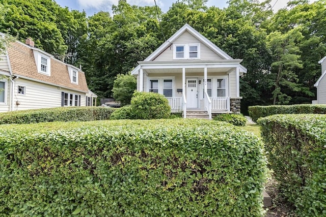 108 Arlington Rd, Woburn, MA 01801 - view of front facade with a porch