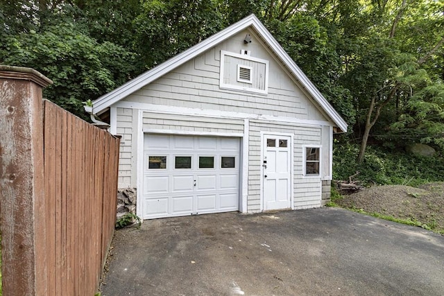 108 Arlington Rd, Woburn, MA 01801 - detached garage featuring asphalt driveway