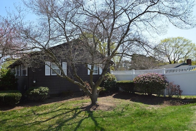 view of yard with fence