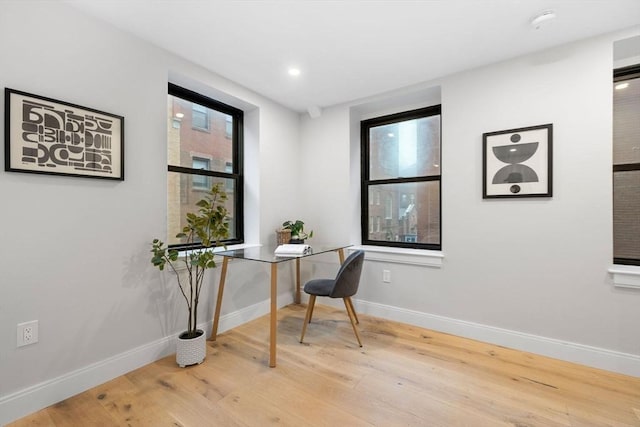 home office featuring light hardwood / wood-style flooring