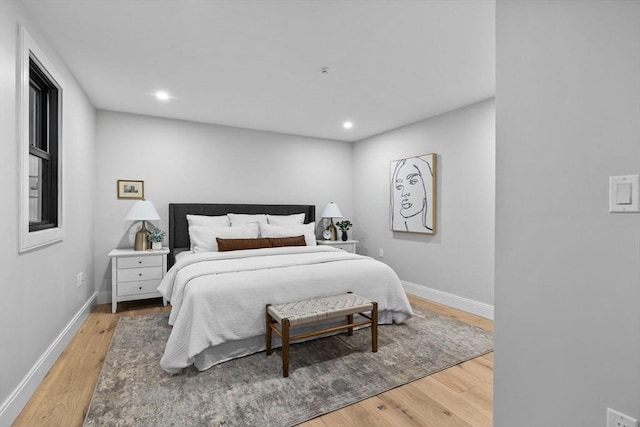 bedroom featuring wood-type flooring