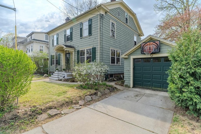 view of front of property featuring driveway, an outdoor structure, a chimney, and a front yard