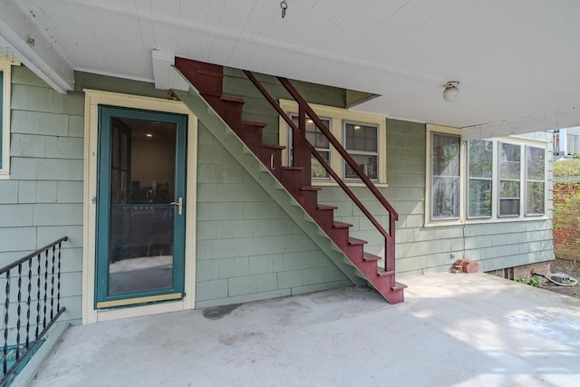 doorway to property with a patio area