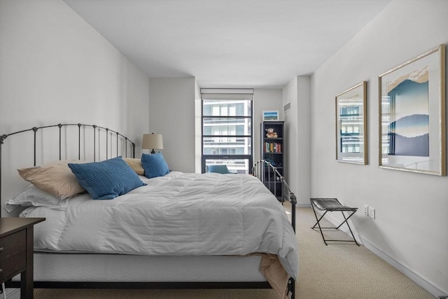 580 Washington St Unit 411, Boston, MA 02111 - bedroom with baseboards and carpet flooring